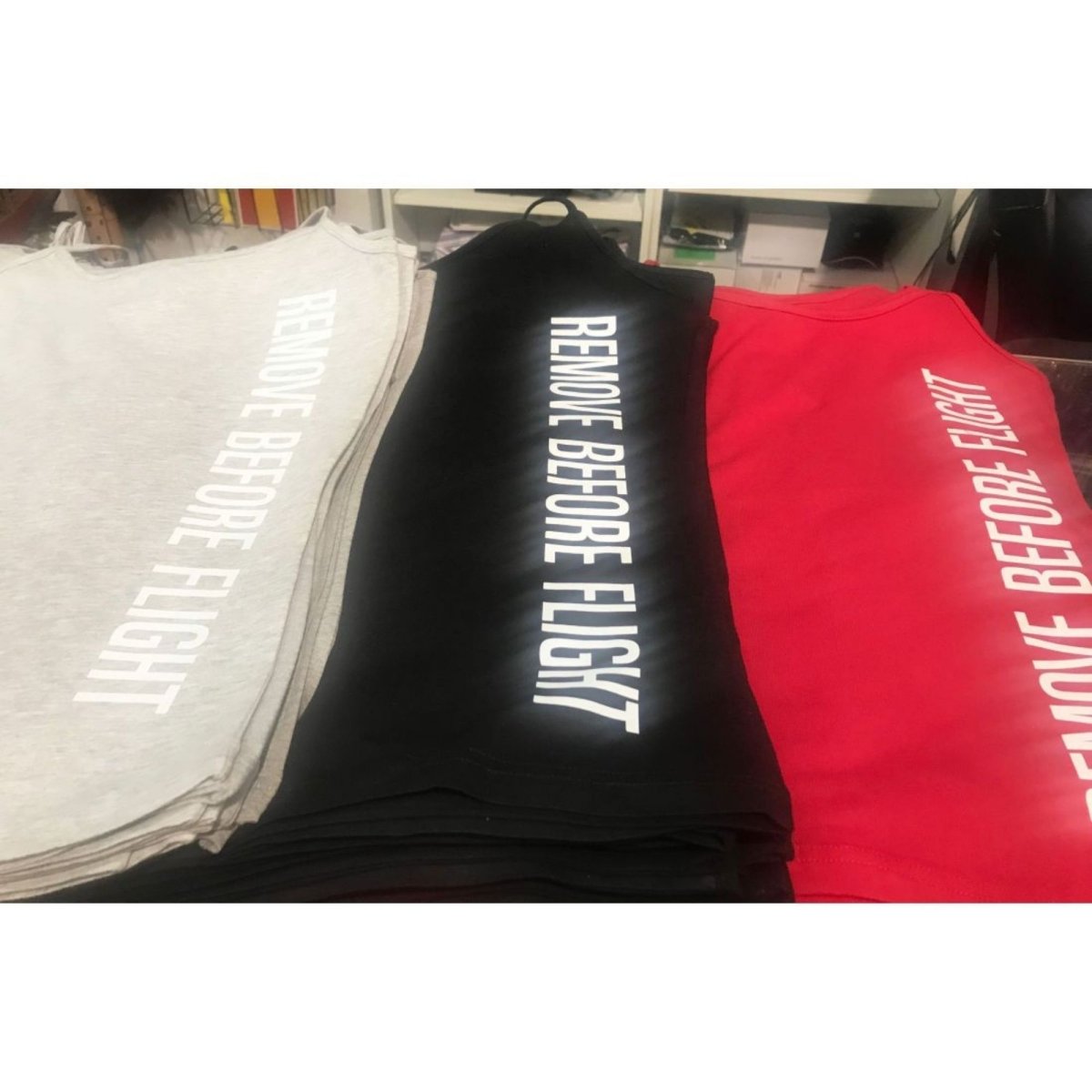 Camiseta de Tirantes Remove Before Flight TIRANTE RBF BuckerBook Premium Camisetas Aviación